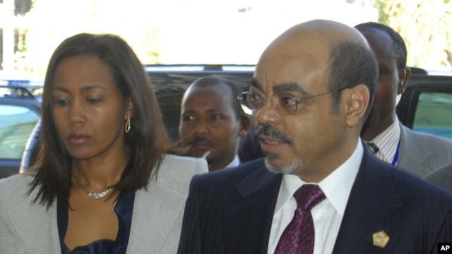 Ethiopia Prime Minister Meles Zenawi with First Lady Azeb Mesfin arrive at the African Union summit being held in Addis Ababa, January 30, 2011. 