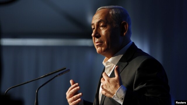Israel's Prime Minister Benjamin Netanyahu delivers a speech during a cornerstone laying ceremony for a new hospital in the port city of Ashdod, November 8, 2012.
