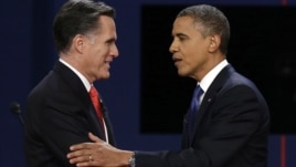 Republican presidential nominee Mitt Romney and President Barack Obama shake hands after the first presidential debate at the University of Denver, in Colorado, Oct. 3, 2012.p