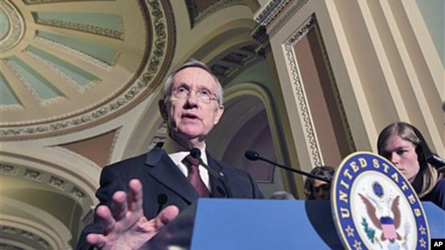 Senate Majority Leader Harry Reid of Nevada speaks to reporters on Capitol Hill in Washington (file photo)