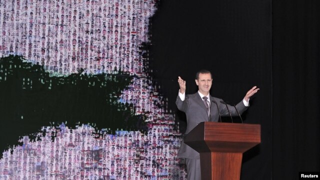 Tổng thống Syria Bashar al-Assad đọc diễn văn tại Nhà hát trong thủ đô Damascus, 6/1/13