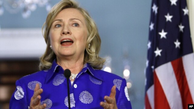 Secretary of State Hillary Rodham Clinton gestures while speaking at the State Department in Washington, Monday, July 11, 2011, during her meeting with European Union High Representative Catherine Ashton. (AP Photo/Jacquelyn Martin)