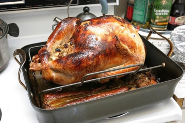 Roasted turkey is the main dish in a traditional American Thanksgiving meal