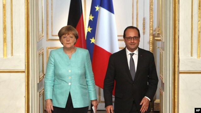 Tổng thống Pháp Francois Hollande và Thủ tướng Đức Angela Merkel tại điện Elysee, Paris, ngày 6/7/2015.