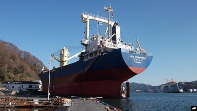 The 6,000-ton 'Asia Symphony' was washed onto the Kamaishi docks by the tsunami