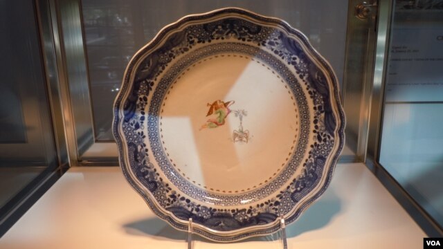 Porcelain which was made to order in China for President George Washington and his wife Martha. This one plate is expected to sell at auction for between $25,000 and $40,000. (VOA/J. Taboh)          