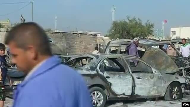 Hoton wata mota da bam ya fasa kennan a Iraqi. 