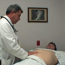 Professional actor Tom Wyatt acts the role of patient with Kurt Haspert, a nurse practitioner student.