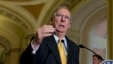 Senate Minority Leader Mitch McConnell of Ky. gestures during a news conference on Capitol Hill in Washington, May 21, 2013.