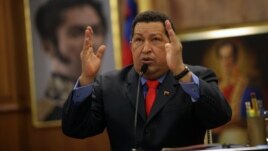 Venezuela's President Hugo Chavez talks during a press conference at Miraflores palace in Caracas, October 9, 2012.