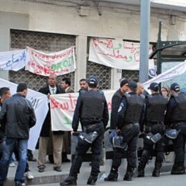 Riot police blocking a teachers strike for better benefits in Algiers