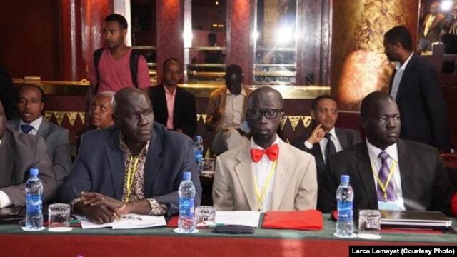 Opposition negotiators Hussein Mar Nyuot (L), and Mabior de Garang (C) at peace talks for South Sudan in Addis Ababa. 