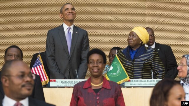 US President Barack Obama (L), alongside African Union Chairperson Nkosazana Dlamini Zuma (R), arrives to speak about security and economic issues and US-Africa relations in Africa at the African Union Headquarters in Addis Ababa, on July 28, 2015.