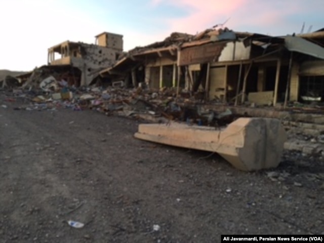 FILE - U.S. airstrikes damaged an Islamic State military base in the center of Sinjar.