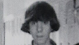 This undated photo shows Adam Lanza posing for a group photo of the technology club which appeared in the Newtown High School yearbook.
