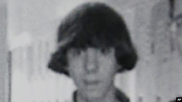 This undated photo shows Adam Lanza posing for a group photo of the technology club which appeared in the Newtown High School yearbook.
