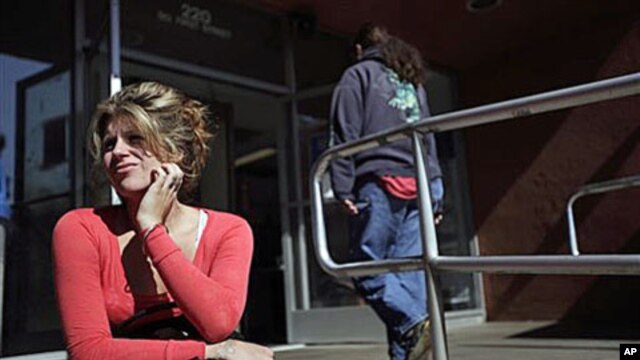 A woman who only gave her first name, Ally, said it was her first time applying for food stamps - the Supplemental Nutrition Assistance Program (SNAP) - at a city building in El Cajon, Calif., May 2010 (file photo)