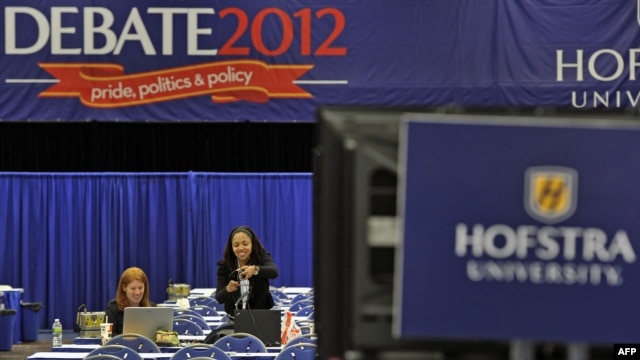 Media sets up in Spin Alley ahead of the second debate between Republican presidential candidate Mitt Romney and US President Barack Obama, to be held at the David Mack Center at Hofstra University in Hempstead, New York, October 15, 2012. 