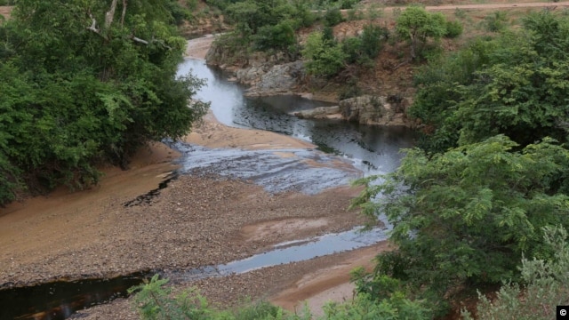 Officials say 33,000 liters of industrial oil spilled into this river late on July 12, 2012 potentially impacting the drinking water for millions of people in Zamfara and Sokoto states in Nigeria. (Photo courtesy Ivan Gayton)