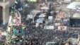 Anti-government protesters build barricades around the Independence Square during clashes with riot police in Kyiv, Feb. 20, 2014.