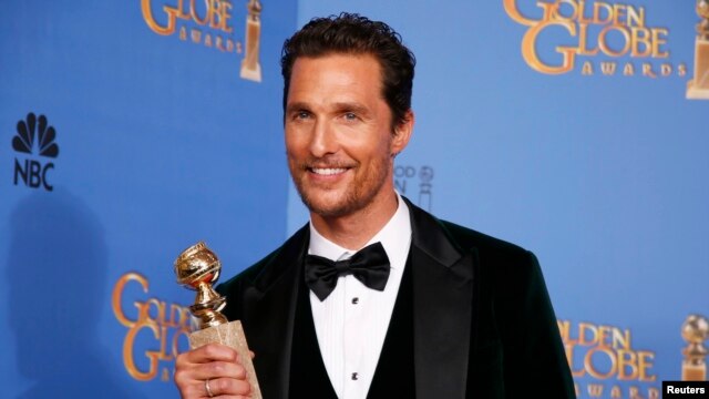 Actor Matthew McConaughey poses backstage with his award for Best Actor in a Motion Picture, Drama for his role in "Dallas Buyers Club" at the 71st annual Golden Globe Awards in Beverly Hills, California, Jan. 12, 2014.