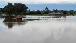Homes flooded by water after the river Sondu Miriu burst it's banks in southern Nyanza , Kenya, April 29, 2012.