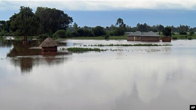 Homes flooded by water after the river Sondu Miriu burst it's banks in southern Nyanza , Kenya, April 29, 2012.
