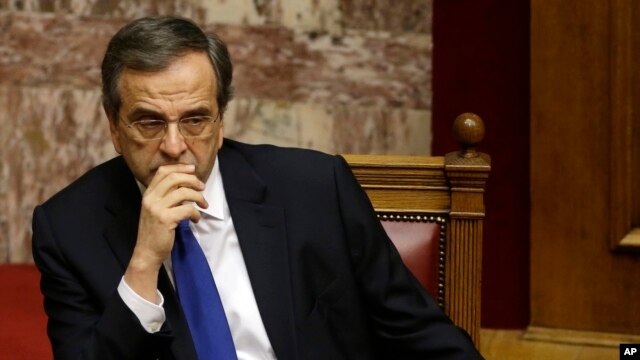 Greece's Prime Minister Antonis Samaras attends the first round of voting to elect a new Greek president at the Parliament in Athens, Dec. 17, 2014.