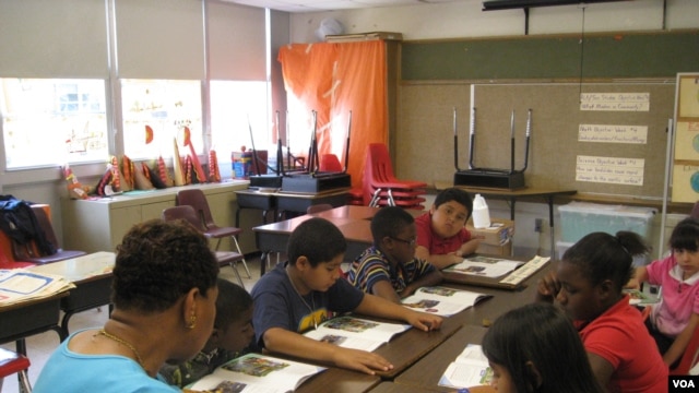 Teacher Gloria Pegram leads a summer school session at Bushman Elementary in Dallas, Texas
