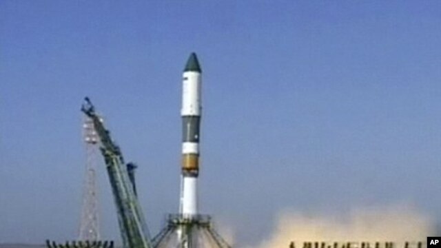 In this image made from Rossiya 24 television channel a Soyuz rocket booster carrying Progress supply ship is launched from the Baikonur cosmodrome in Kazakhstan. (File Photo - August 24, 2011)