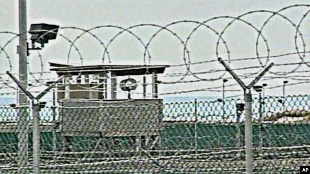 Barbed wire fence at the Camp Delta detention compound which houses foreign prisoners since 2002 at Guantanamo Bay U.S. Naval Base in Cuba