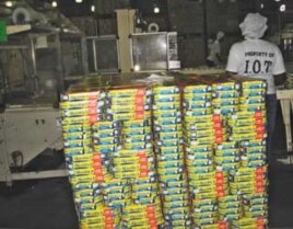 Canned fish being packed for exportation at the Indian Ocean tuna processing plant in Seychelles