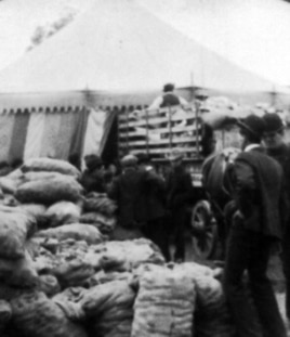 Providing for homeless thousands - delivering bread at Commissary tent