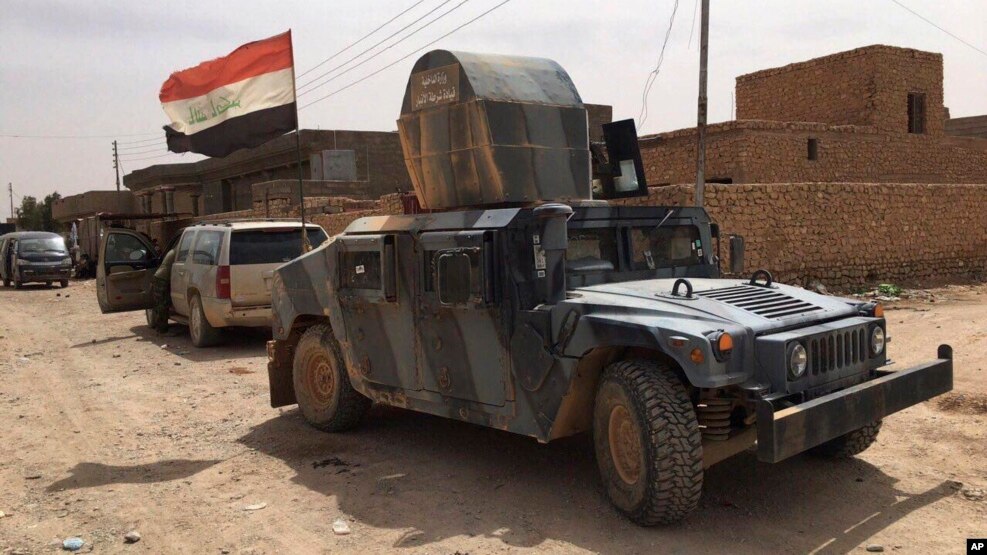 Lực lượng an ninh Iraq tuần tra sau khi đẩy lui chiến binh Hồi giáo Nhà nước ra khỏi Fallujah, ngày 26/6/2016.