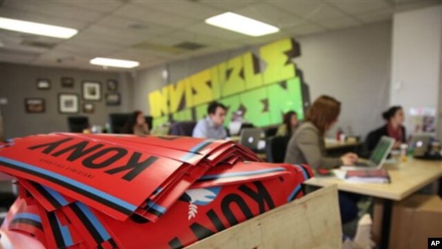 A box full to the brim with KONY 2012 campaign posters are shown Thursday March 8, 2012 at the Invisible Children Movement offices in San Diego. 