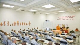 A class of boys receives instruction at the Hsi Lai Temple in Los Angeles, California
