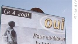 A billboard calling to vote Yes for the August O4, 2009 referendum on a new constitution adorns the streets of Niamey, 01 Aug 2009