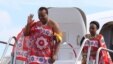 King of Swaziland Mswati III (Front) and one of his 13 wives disembark from a plane after arriving at Katunayake International airport in Colombo, Sri Lanka, August 13, 2012. (Reuters)