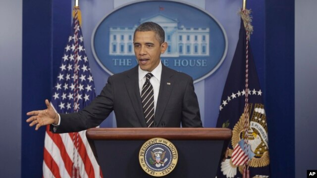 President Barack Obama gestures as speaks in the James Brady Press Briefing Room at the White House in Washington,  February 5, 2013. 