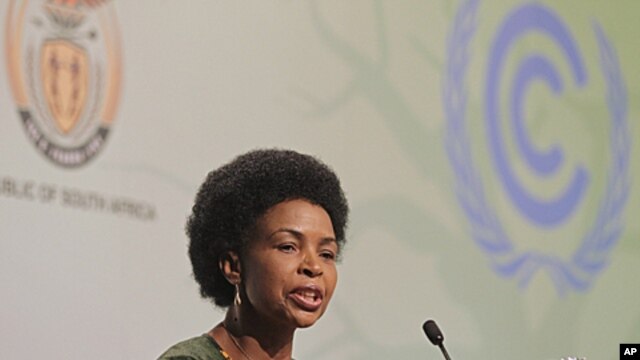 South Africa's Nkoana Mashabane newly elected President of COP 17, speaks during the climate conference opening ceremony held in the city of Durban, South Africa, November 28, 2011.
