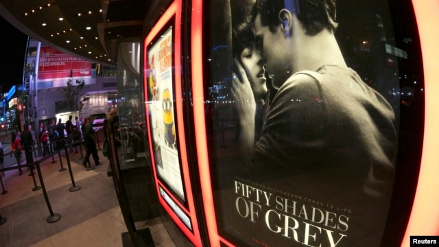 A film poster for "Fifty Shades of Grey" is pictured at Regal Theater in Los Angeles, California, Feb. 12, 2015. 