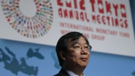 People's Bank of China Deputy Governor Yi Gang is seen at the IMF/World Bank Group meeting in Tokyo October 14, 2012.  