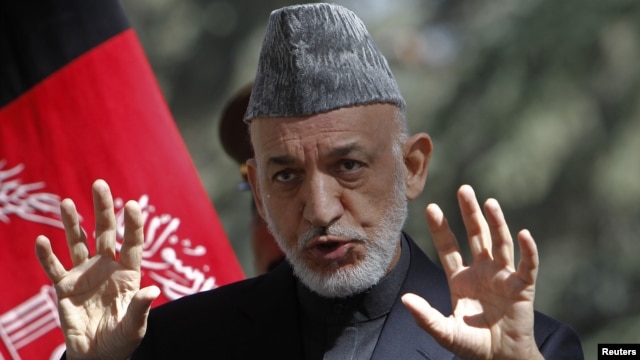 Afghanistan's President Hamid Karzai speaks during a news conference in Kabul, October 4, 2012.