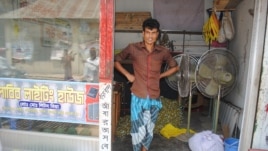 Former garment worker Liton Mia was injured in the collapse of Rana Plaza but today he owns a shop that rents out lights and equipment for weddings. (Amy Yee for VOA News)
