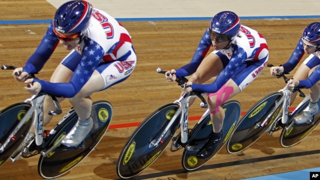 Team USA with Jennie Reed, Dotsie Bausch, and Sarah Hammer (L-R), competes to take a silver medal in the women's team pursuit final during the Track Cycling World Championships in Apeldoorn, Netherlands, March 24, 2011.