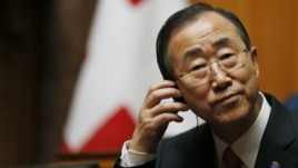 UN Secretary-General Ban Ki-moon listens to a speech in the Swiss National Council during his visit in the Autumn Parliament Session in Bern, September 11, 2012.