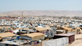 The Domiz camp is severely overcrowded and was only built to house about half of the people currently living there. (Phillip Wellman for VOA)