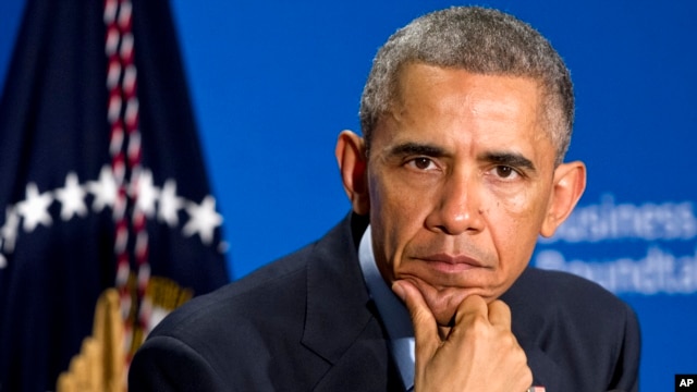 President Barack Obama listens to a question during a meeting with leading CEOs to discuss ways to promote the economy and create jobs during his last two years in office, Wednesday, Dec. 3, 2014.