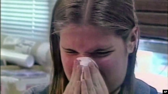 An allergy sufferer sneezes, and scientists say rising average temperatures and elevated levels of carbon dioxide are spurring the growth of many weedy, allergenic plants, and extending the season of suffering for pollen-sensitive people across the countr