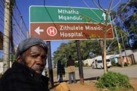 A man waits outside Zithulele Hospital for an appointment with physiotherapist Laura Grobicki